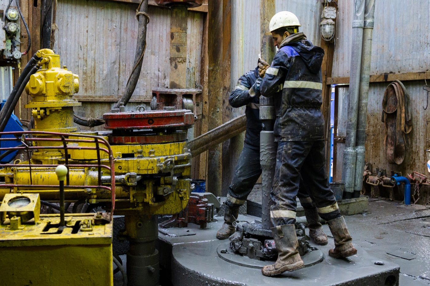 A crew working a drilling rig