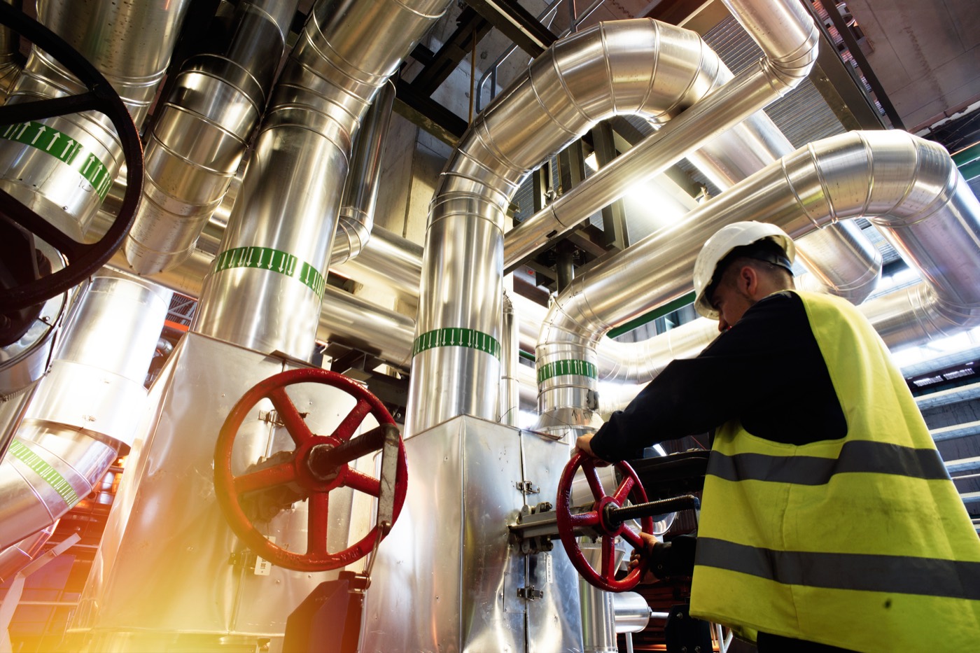 Technician on a pumping and treatment skid